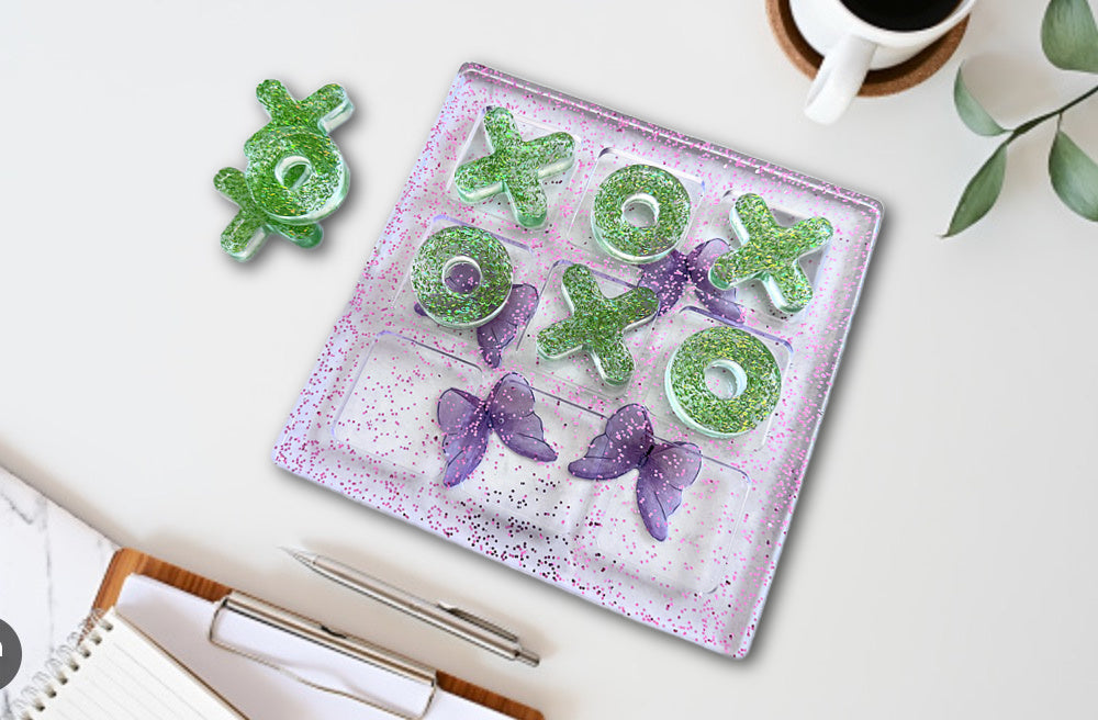 Purple Tic Tac Toe Board with Butterflies and Green Letters